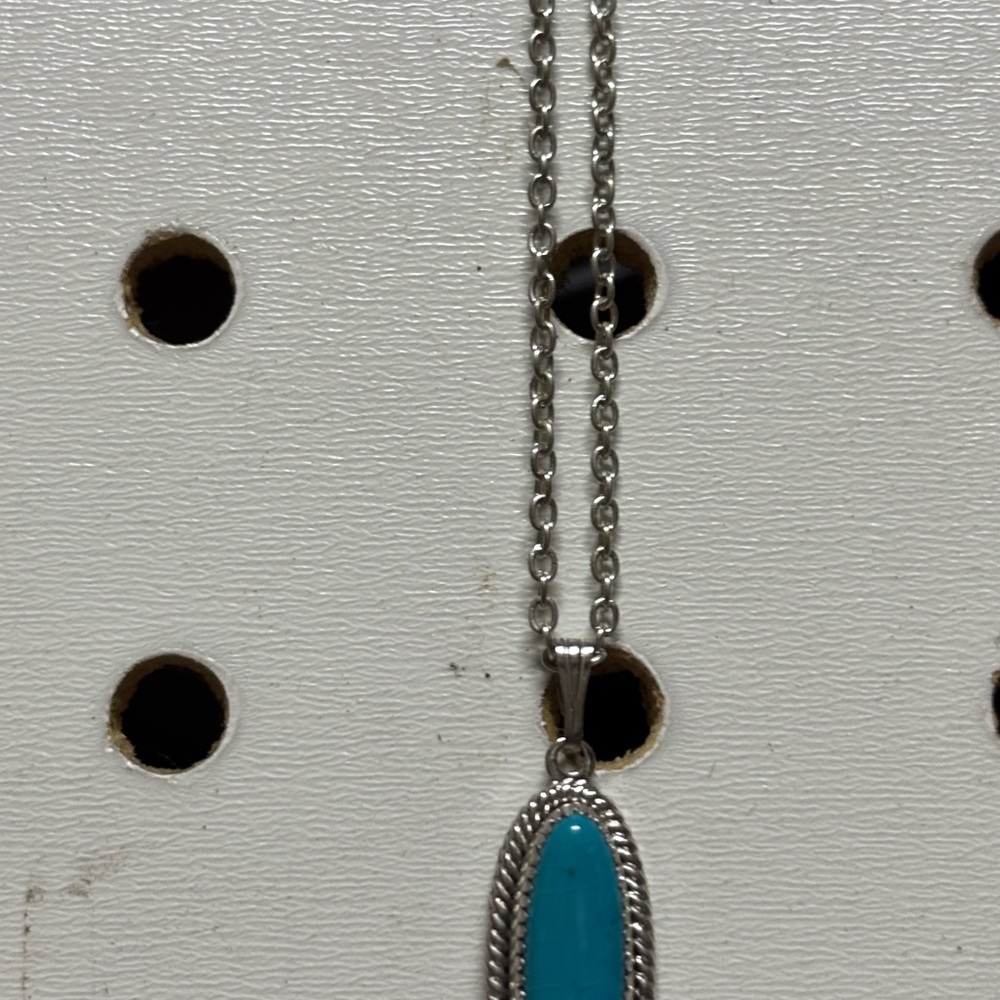 Elegant Silver and Turquoise Pendant Necklace